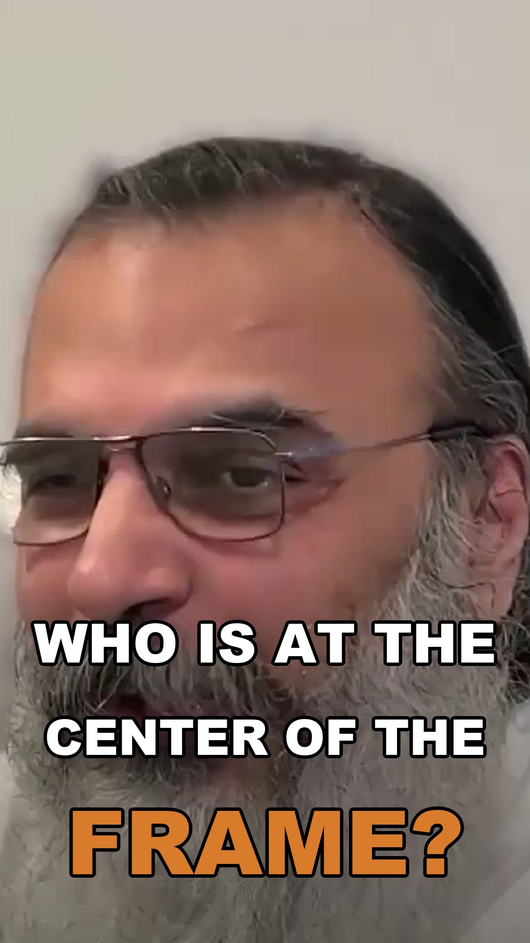 Who is at the center of the frame?